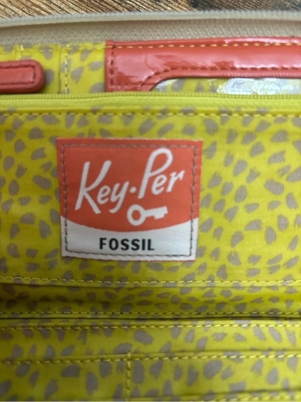 Fossil Floral Zip Wallet in Yellow, Orange, Brown and Black